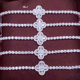 Set of diamond-studded bracelets on a dark background