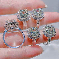 Set of diamond rings on a hand with a blurred background