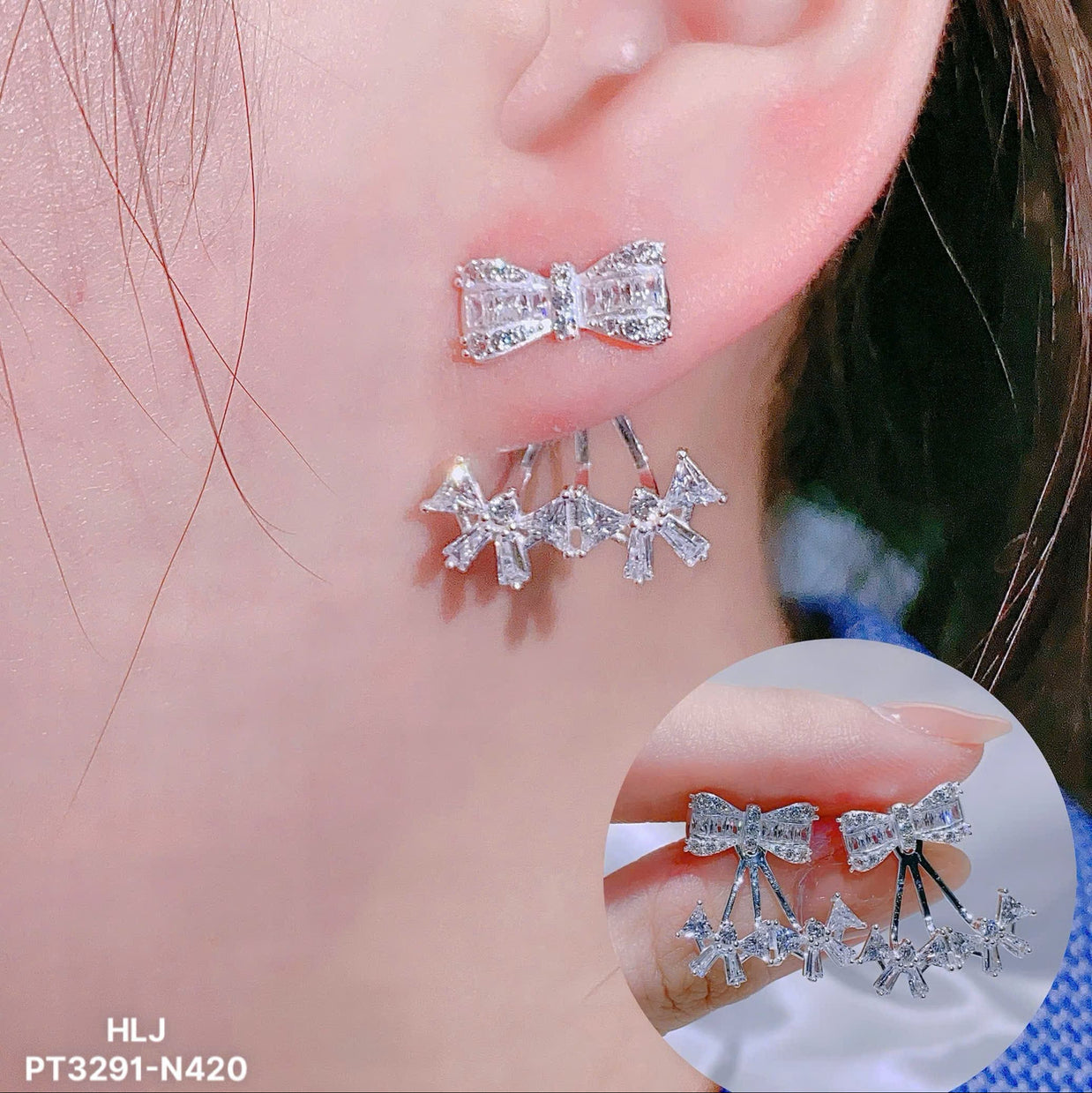 Silver bow-shaped earrings worn on an ear with a close-up inset.