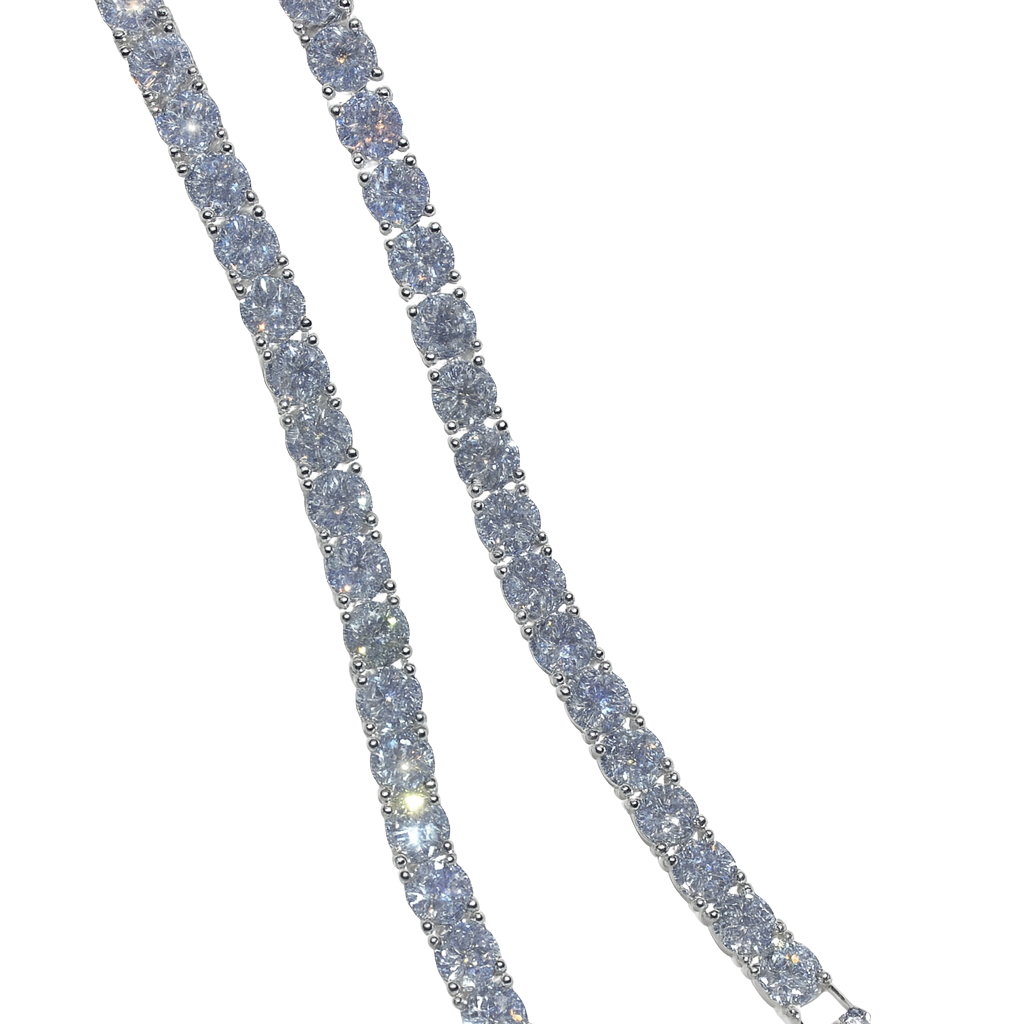 Silver bracelet with clear stones on a white background