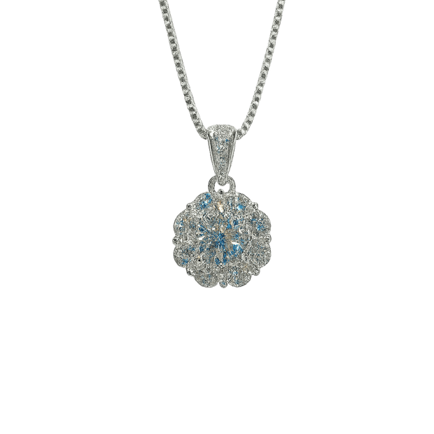 Silver necklace with a floral pendant on a green background