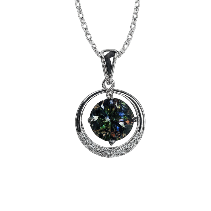 Silver necklace with a round pendant on a white background