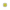 Yellow diamond ring with white gold prongs on a white background