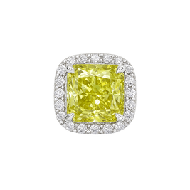 Yellow diamond ring with white gold prongs on a white background