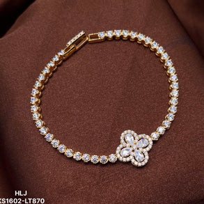 Clover Grace Tennis Bracelet – Triple-Tone Elegance