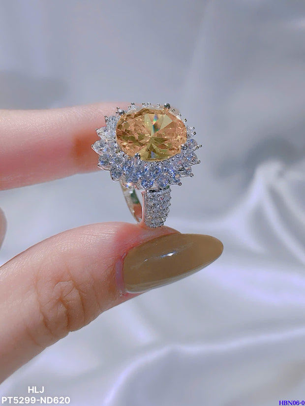 Empress Flame Oval Halo Ring – Crown Radiance