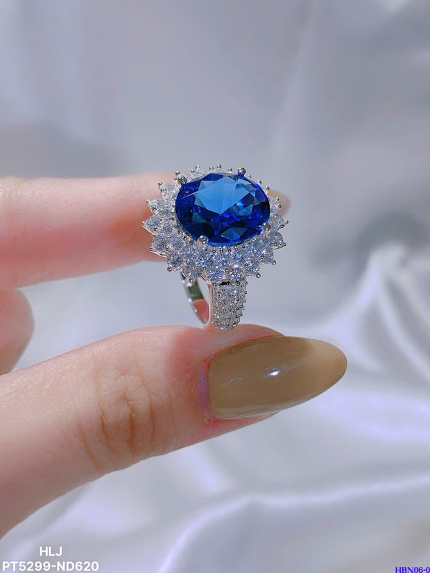 Empress Flame Oval Halo Ring – Crown Radiance