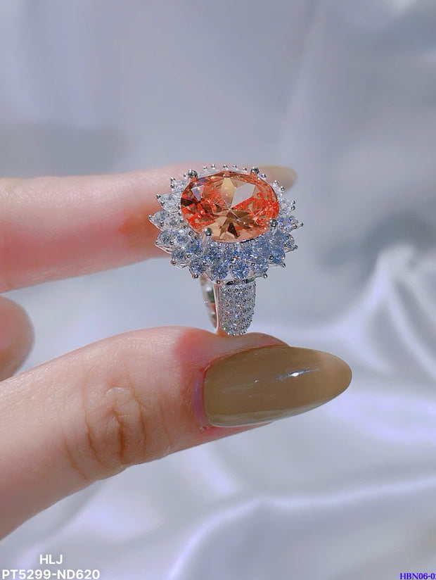 Empress Flame Oval Halo Ring – Crown Radiance