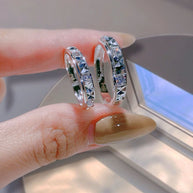 GeoGleam Pyramid Couple Rings – Modern Platinum Duo